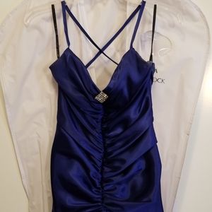 Satin high low, ultra low back dress.